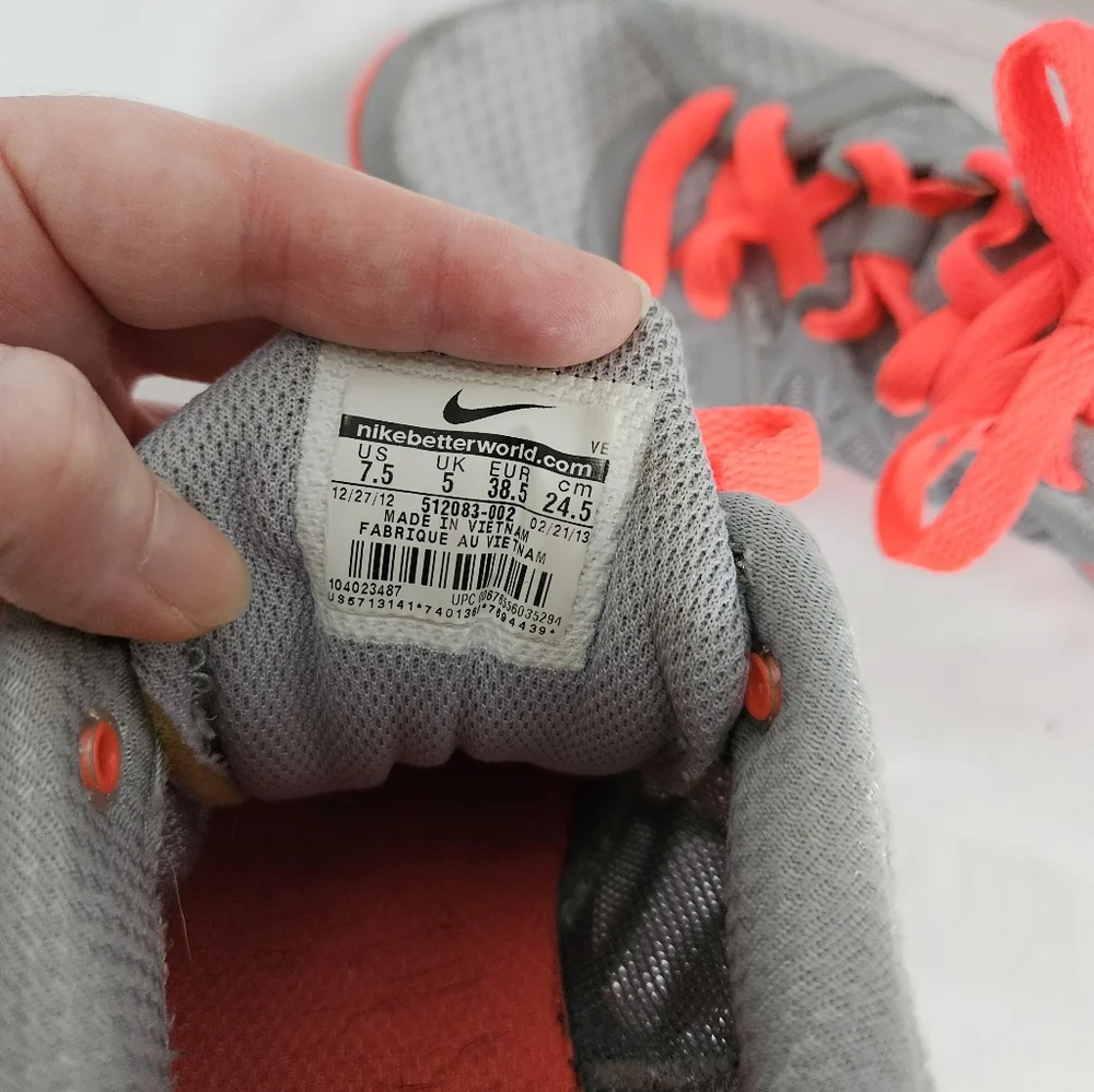Nike neon pink and grey athletic shoes women's size 7.5